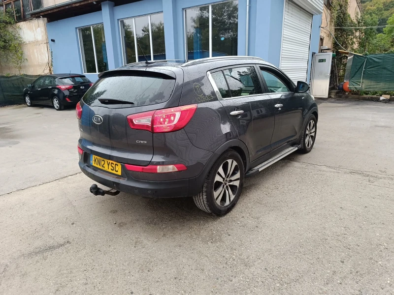 Kia Sportage 2.0 CRDI AWD , снимка 8 - Автомобили и джипове - 51856245
