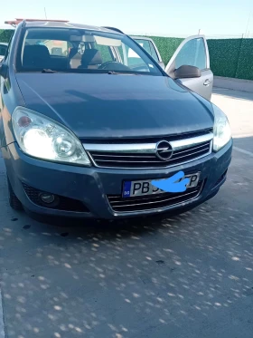 Opel Astra H Station Wagon 16 116hp газ бензин, снимка 1
