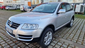     VW Touareg ,  