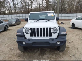 Jeep Wrangler 3.6l 4-Door Sport Altitude 4X4 - 26600 € / 52025.08 лв. - 36492593 12