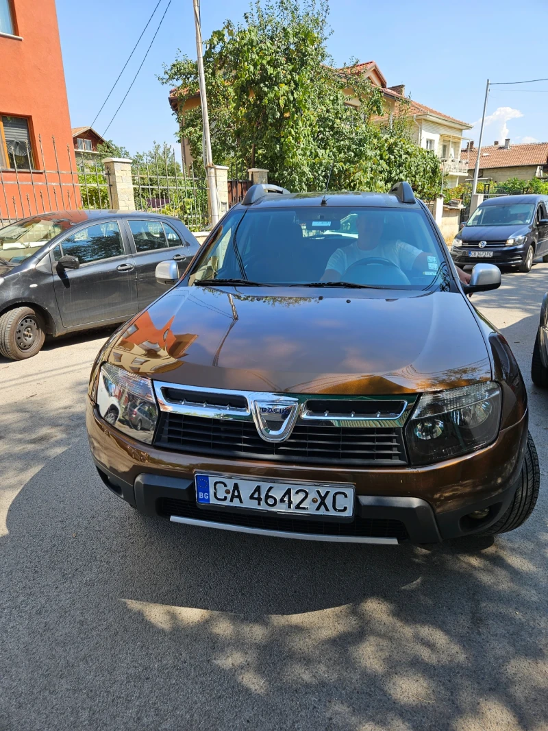 Dacia Duster 1.6 4х4, снимка 1 - Автомобили и джипове - 46988486