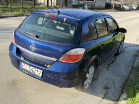 Opel Astra 1.8I 125 газ AВТОМАТИК, снимка 9