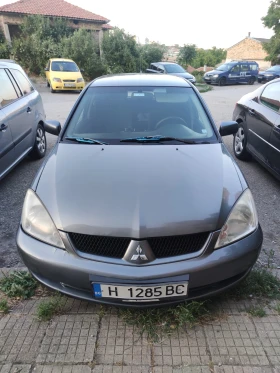 Mitsubishi Lancer 1.6 - 2400 € / 4693.99 лв. - 52947238 6