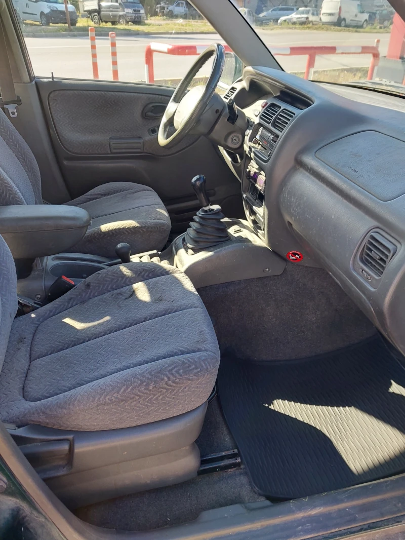 Suzuki Grand vitara 2.0 HDI klima 4x4, снимка 11 - Автомобили и джипове - 51724619