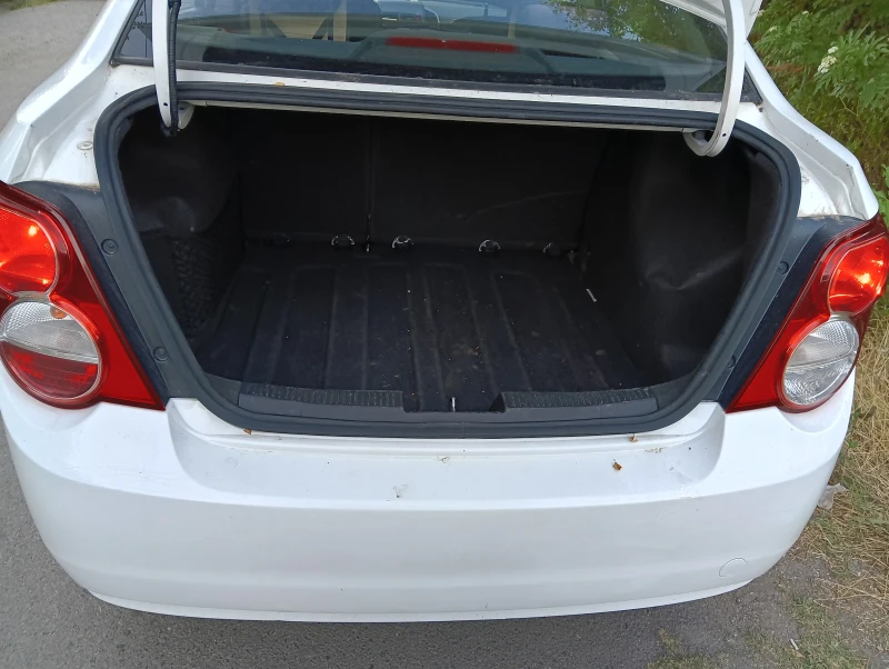 Chevrolet Aveo, снимка 7 - Автомобили и джипове - 52680551