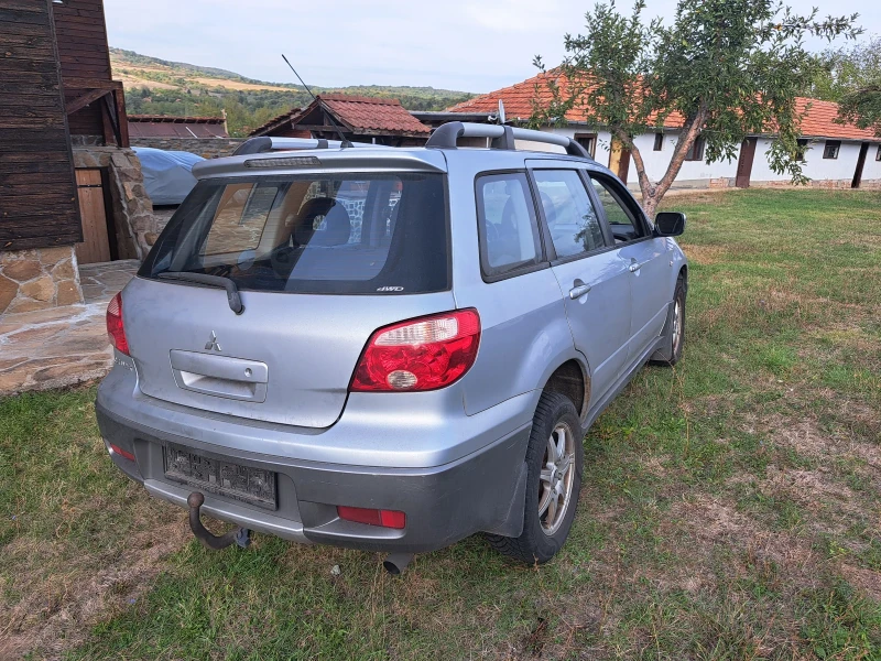 Mitsubishi Outlander 2000куб., снимка 9 - Автомобили и джипове - 47306600