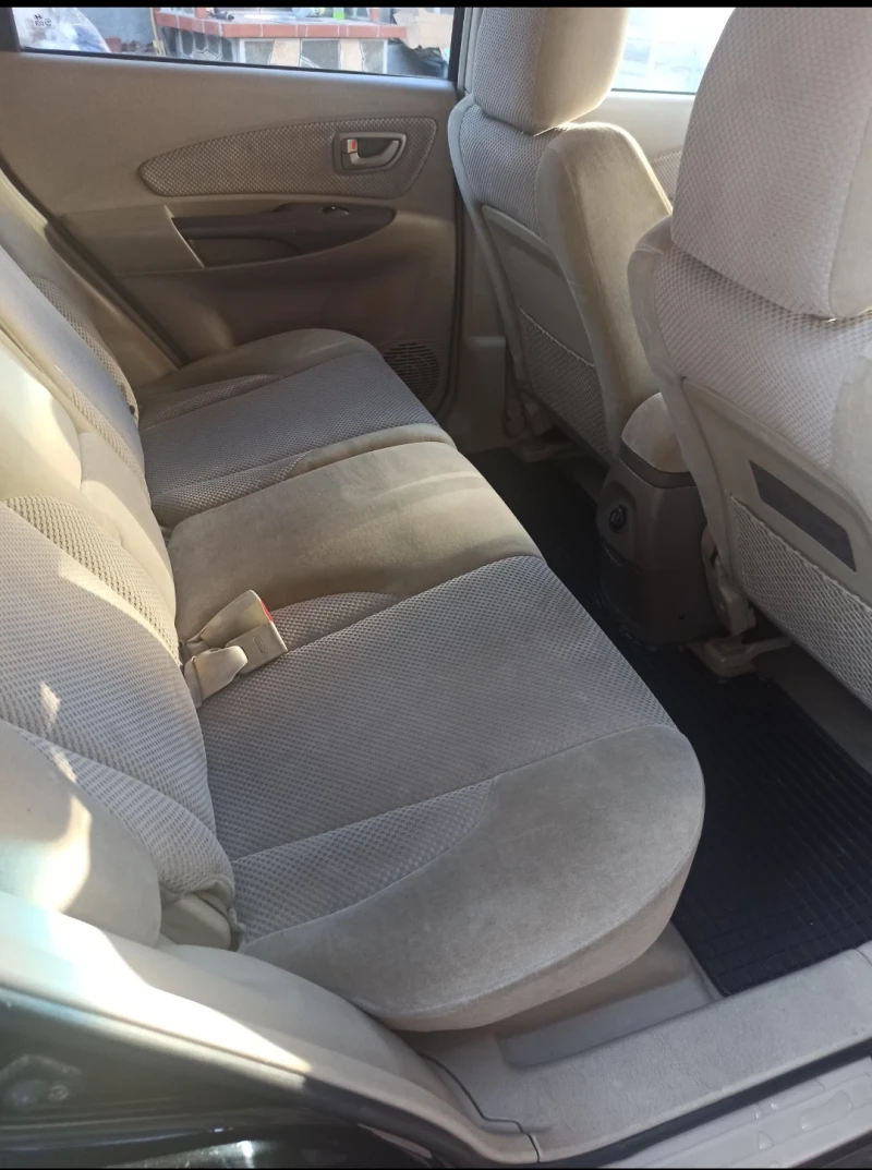 Hyundai Tucson 2.0  141k.c.  4x4 , снимка 8 - Автомобили и джипове - 53131503