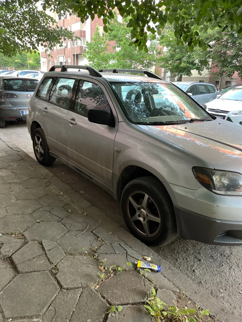 Mitsubishi Outlander Газ-Бензин 2000/136.   2004г 4x4