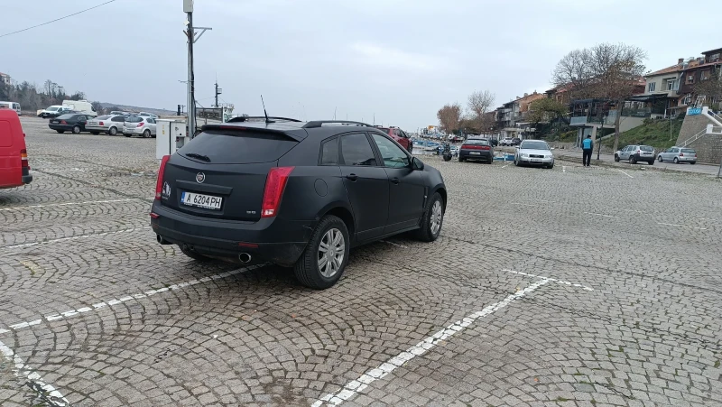 Cadillac Srx, снимка 8 - Автомобили и джипове - 48394121