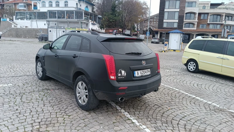 Cadillac Srx, снимка 9 - Автомобили и джипове - 48394121