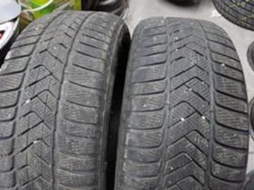 Гуми Зимни 245/45R18, снимка 1
