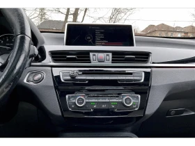 BMW X1 * 28i | Prem Enhanced | Heated Leather | Panoroof  - 31450 лв. / 16080.13 € - 54809257 7