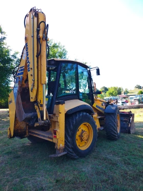Багер Komatsu WB97S, снимка 4