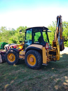 Багер Komatsu WB97S, снимка 5