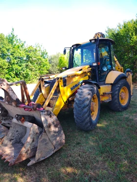 Багер Komatsu WB97S, снимка 1