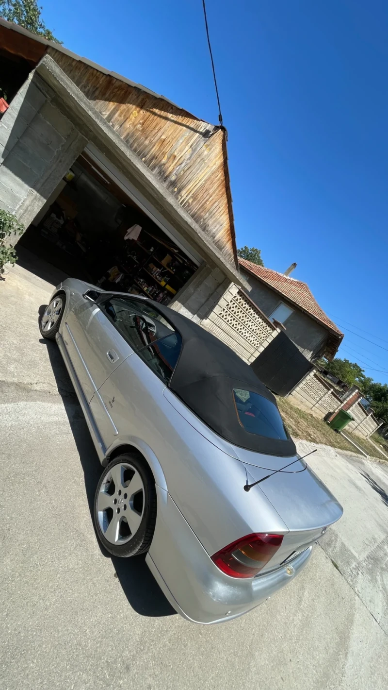 Opel Astra, снимка 10 - Автомобили и джипове - 51311575