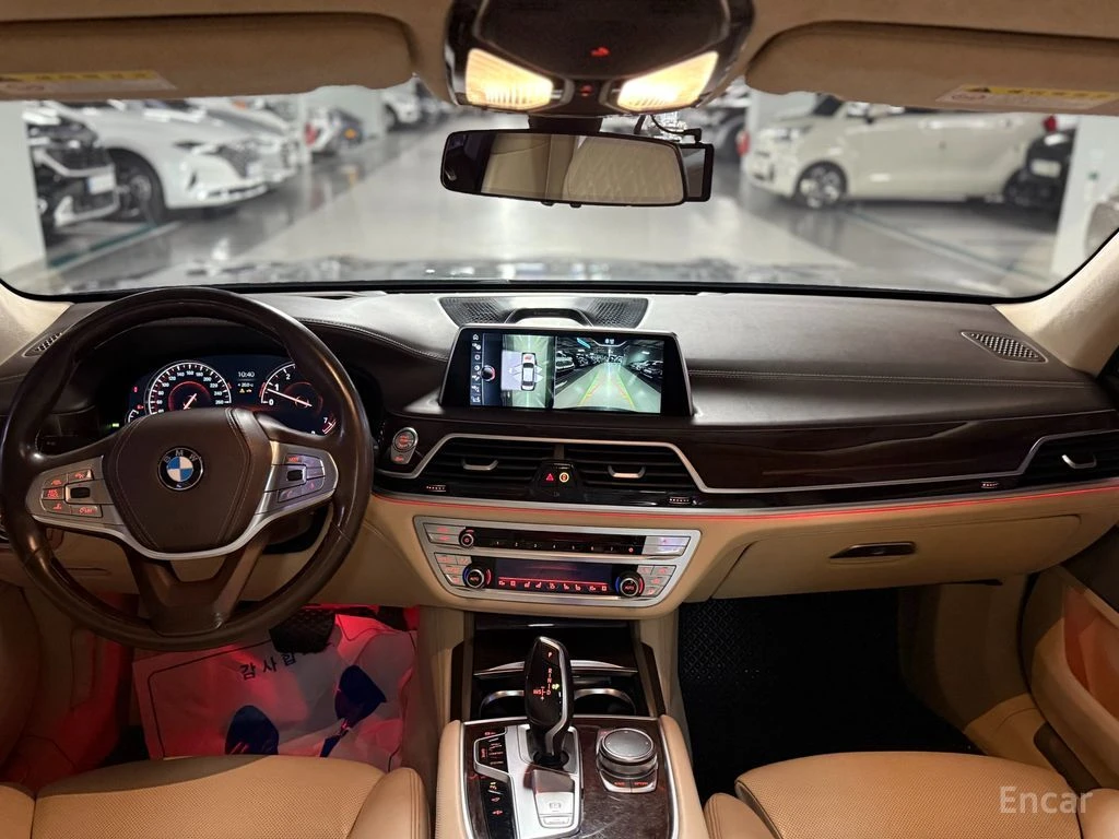 BMW 750 Li xDrive* BOWERS & WILKINS* HEAD-UP* 360 CAM* , снимка 7 - Автомобили и джипове - 54866740