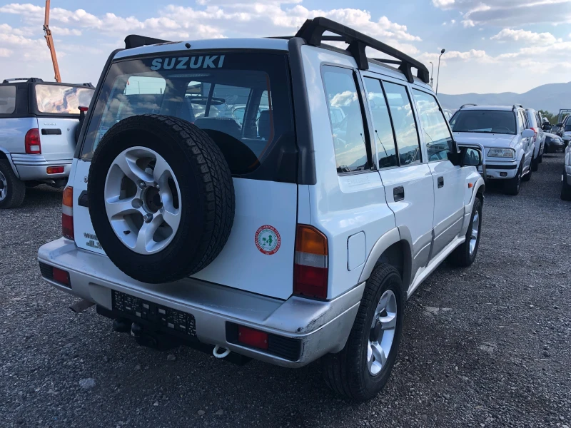 Suzuki Vitara 1.6 16V КЛИМА ГЪРЦИЯ, снимка 7 - Автомобили и джипове - 47013148