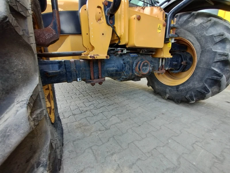 Телескопичен товарач Caterpillar 408D, снимка 14 - Селскостопанска техника - 50220801