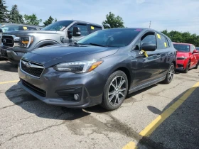 ������ Subaru Impreza