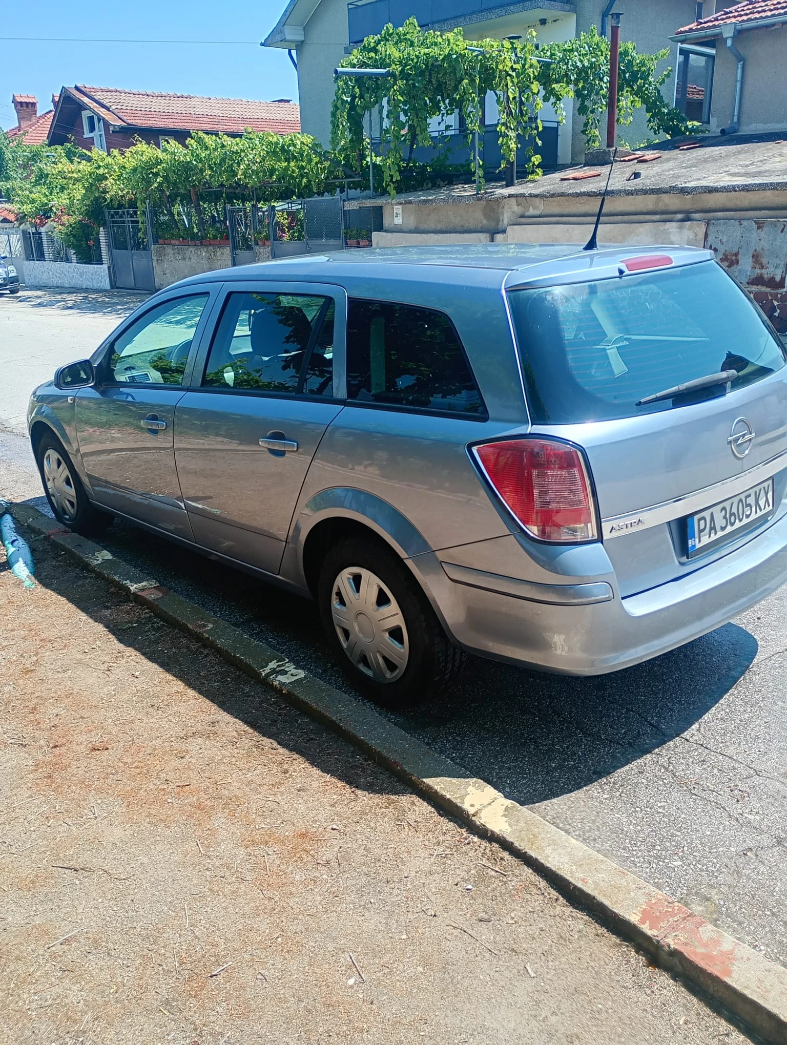 Opel Astra, снимка 12 - Автомобили и джипове - 55340614