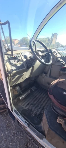 Телескопичен товарач Claas Тарго К70, снимка 4