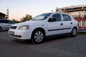 Opel Astra, снимка 1 - Автомобили и джипове - 45635314