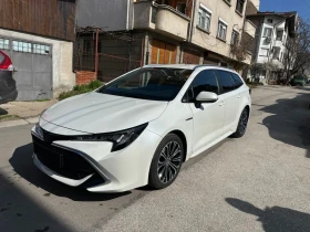 Toyota Corolla 2.0i HYBRID/ГАРАНЦИЯ/Перла 1