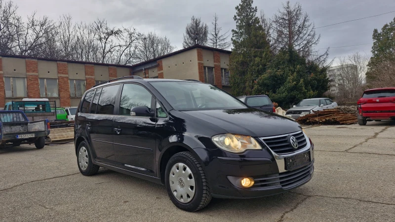 VW Touran 1.9 TDI 105k.