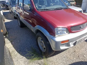 Обява за продажба на Daihatsu Terios 1, 3i KLiMA , 4x4 ~3 999 лв. - изображение 2