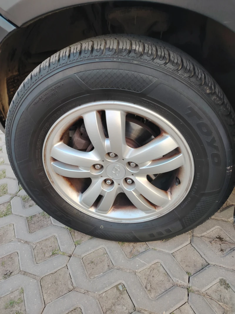 Hyundai Tucson 2.0 4WD L.P.G., снимка 7 - Автомобили и джипове - 49006806