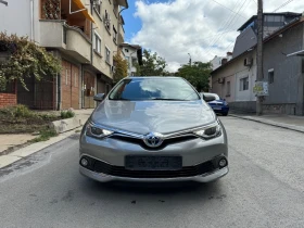 Toyota Auris 1.8i Hybrid/Кожа/Автоматично паркиране, снимка 8