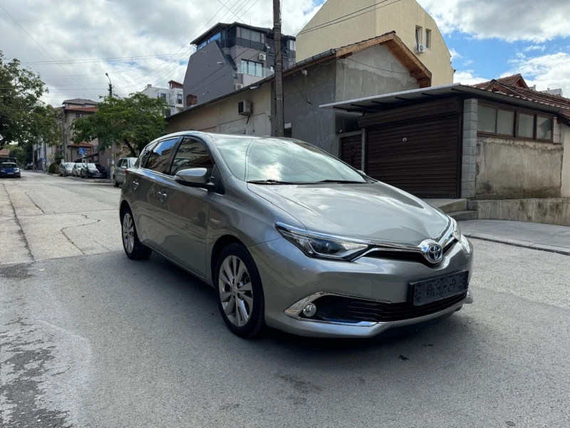 Toyota Auris 1.8i Hybrid/Кожа/Автоматично паркиране, снимка 7 - Автомобили и джипове - 47257473