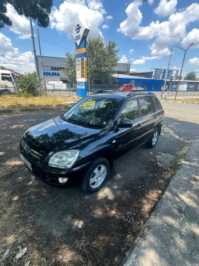 ������ Kia Sportage