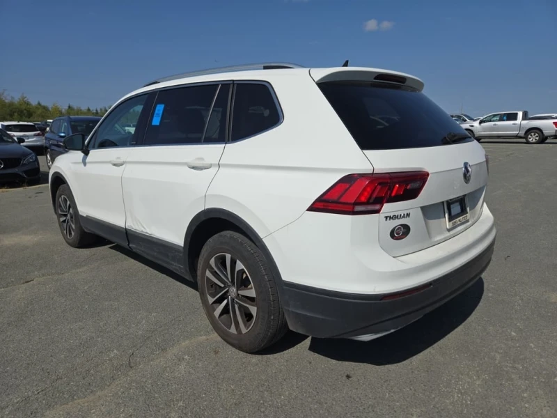VW Tiguan * UNITED * CARFAX * БЕЗ ПЪРВОНАЧАЛНА ВНОСКА, снимка 4 - Автомобили и джипове - 52800993