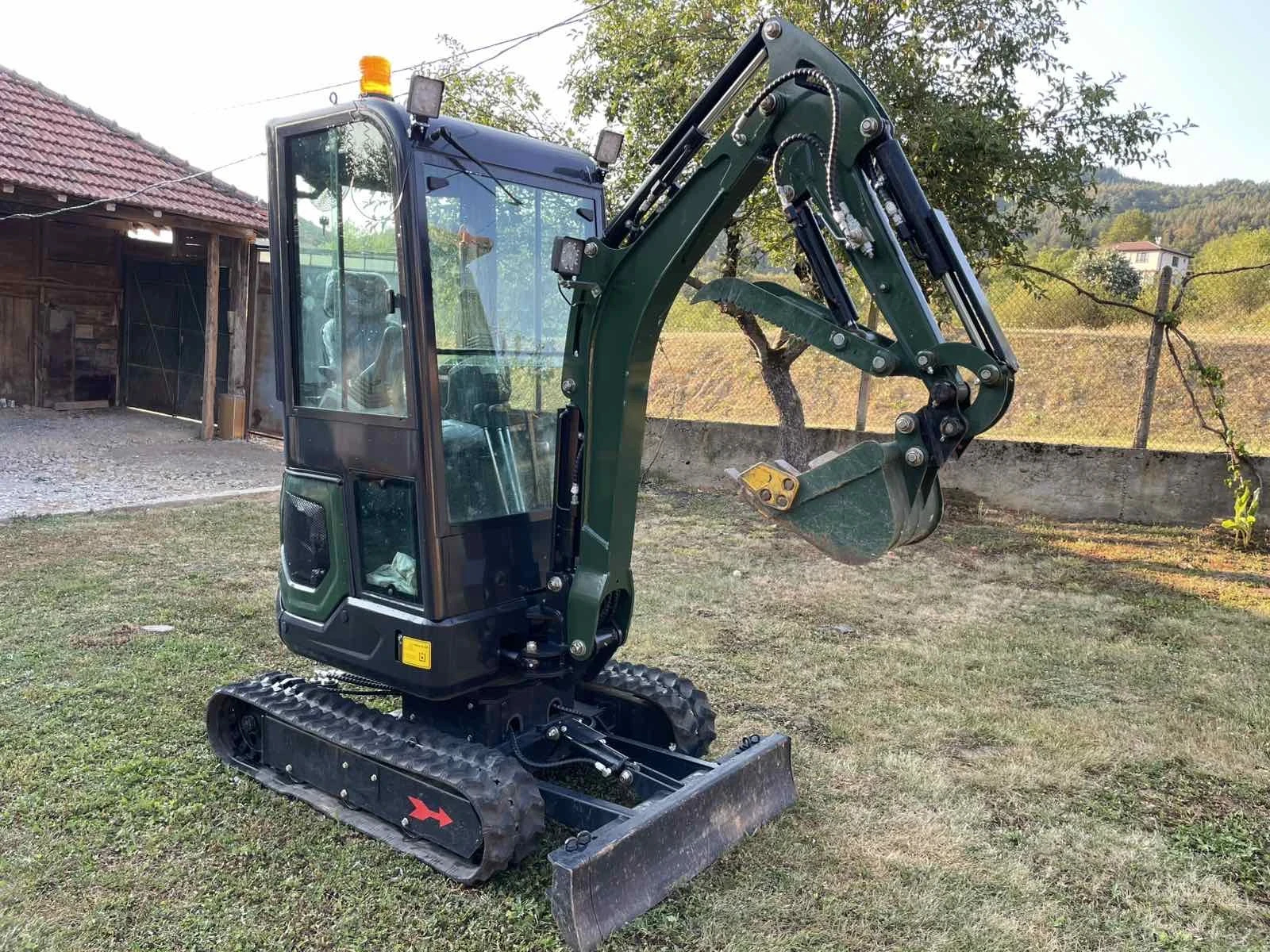 Багер Kubota Muller