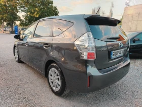 Toyota Prius 1.8 HYBRID/КЛИМАТРОНИК/ПАНОРАМА/КАМЕРА/7-МЕСТЕН!!! - 16999 лв. - 68734871 5