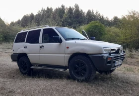 Обява за продажба на Nissan Terrano 2.4i ~5 999 лв. - изображение 3 | Auto.bg Обява за продажба на Nissan Terrano 2.4i ~5 999 лв. - изображение 3