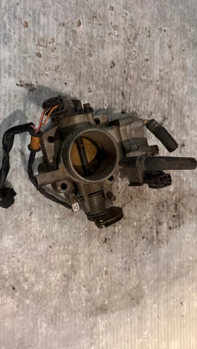 Дроселова Клапа за Mazda 323 -  E0T40671, снимка 1