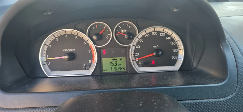 Chevrolet Aveo 1.2 газ клима, снимка 9 - Автомобили и джипове - 52885972