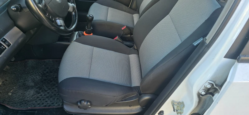 Chevrolet Aveo 1.2 газ клима, снимка 7 - Автомобили и джипове - 52885972