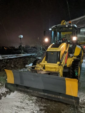 Багер New Holland В 100 В LR, снимка 10