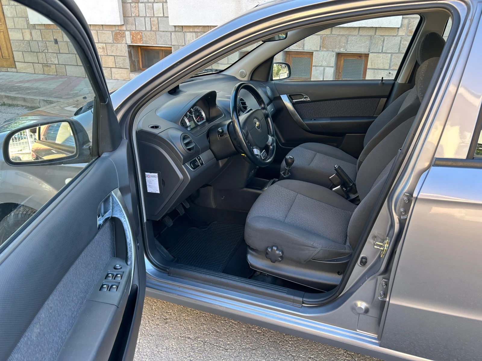 Chevrolet Aveo 1.4i 94k.c. КЛИМАТИК, снимка 8 - Автомобили и джипове - 55889798