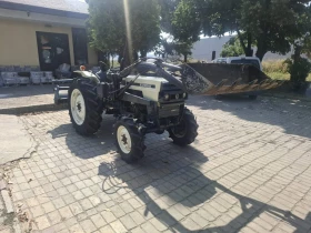 Трактор Mitsubishi 32 к.с. с челен товарач и фреза, снимка 1