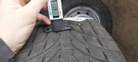 Гуми Зимни 235/65R17, снимка 9