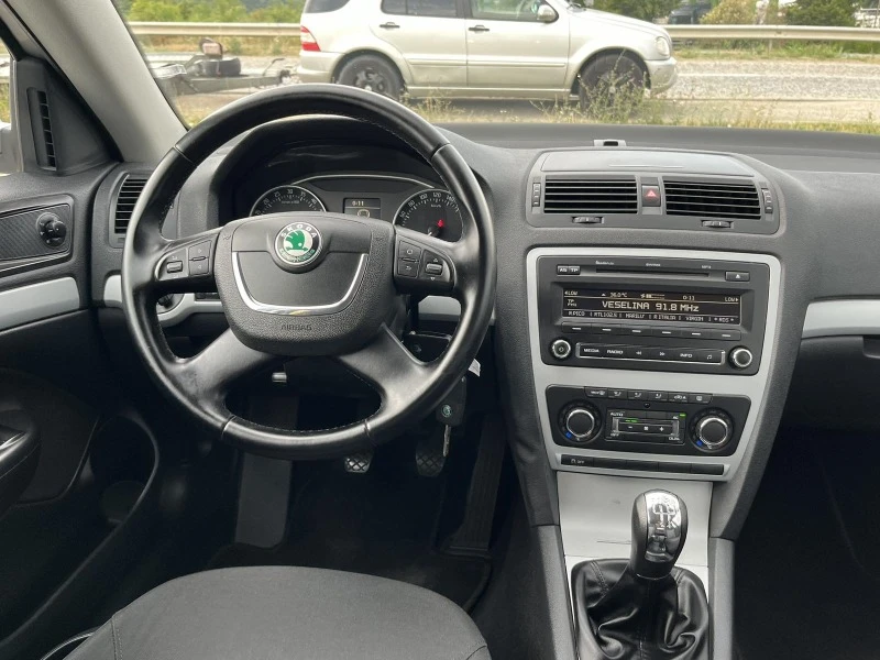 Skoda Octavia 1.6 TDI 105кс EURO 5A КЛИМАТРОНИК АВТОПИЛОТ , снимка 12 - Автомобили и джипове - 46698659