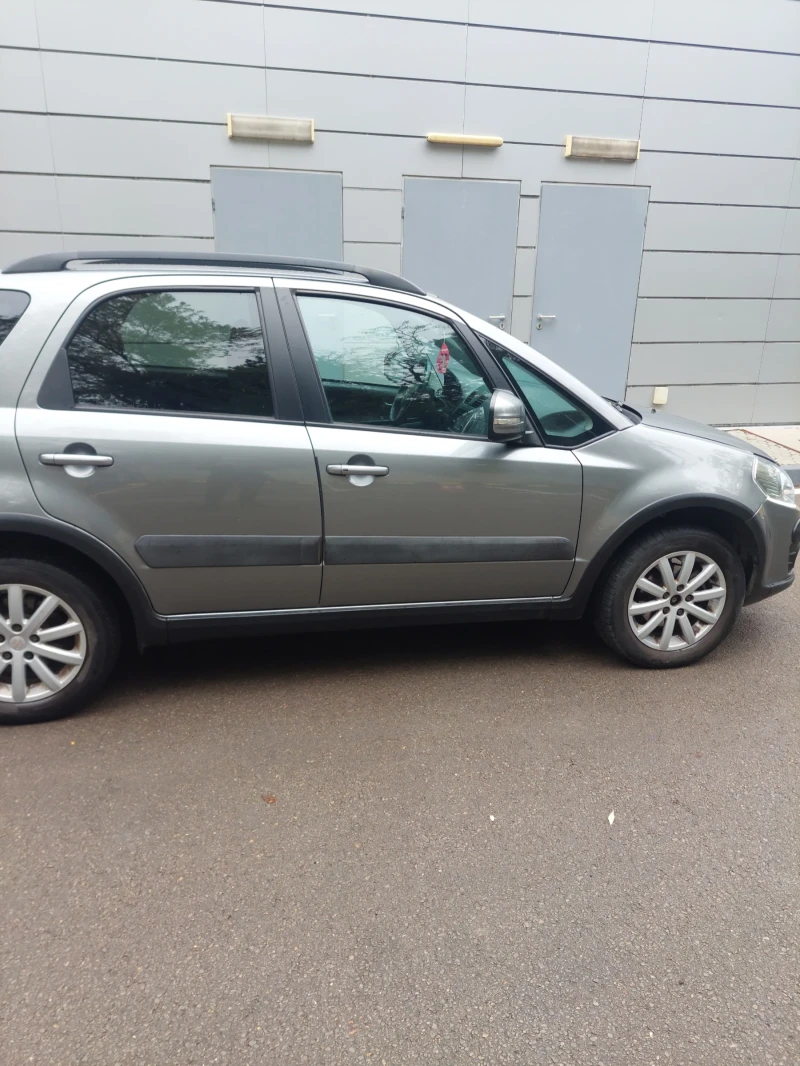 Suzuki SX4 1.6 facelift Navi.klimatronik, снимка 5 - Автомобили и джипове - 48783442