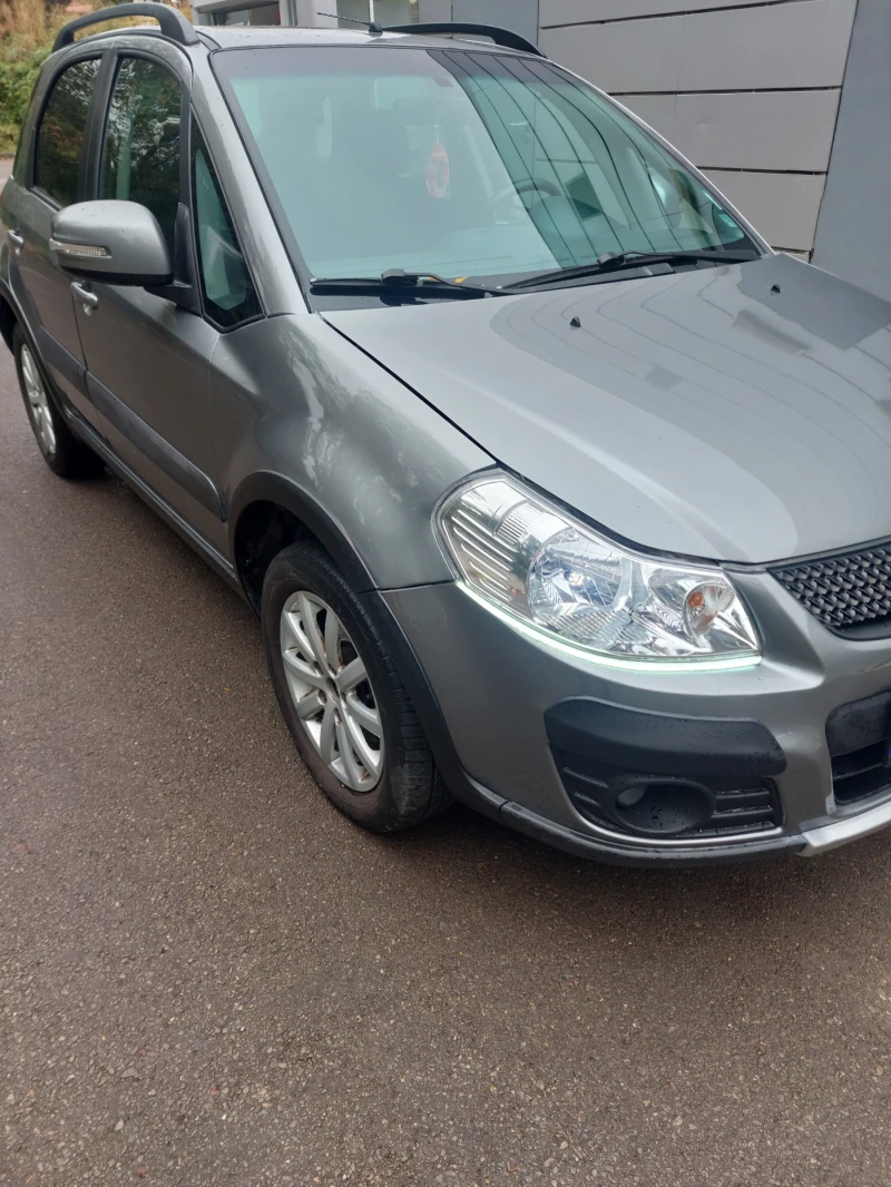 Suzuki SX4 1.6 facelift Navi.klimatronik, снимка 3 - Автомобили и джипове - 48783442