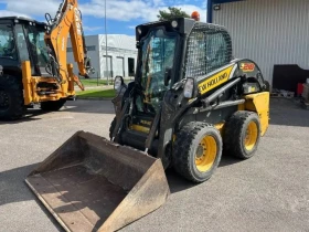 Мини челни товарачи Друга New Holland L218