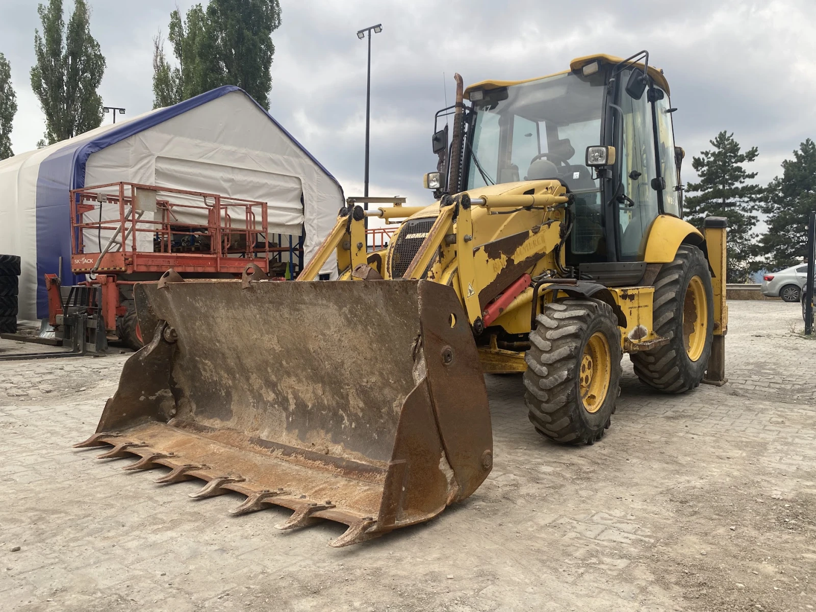 Багер Komatsu WB93B - изображение 2